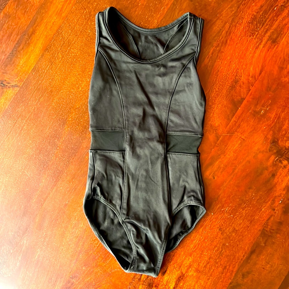 Black leotard with black mesh cut outs